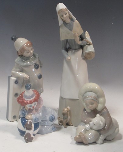 Lot 61 - Four Lladro figures, to include 'Jester Clown...