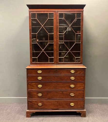 Lot 329 - A George III mahogany secretaire bookcase