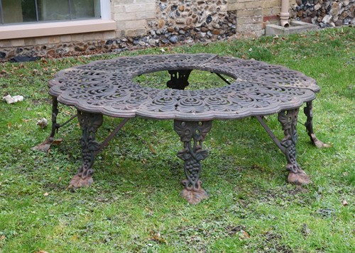 Lot 740 - A Victorian style cast iron tree seat, 20th century