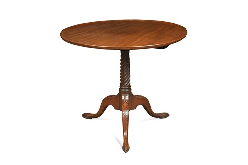 Lot 488 - A George III single planked dished top tripod table