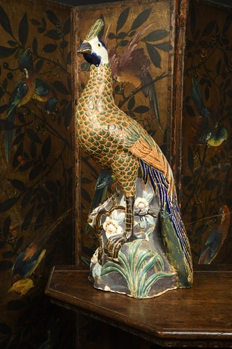 Lot 391 - A pottery peacock, possibly French