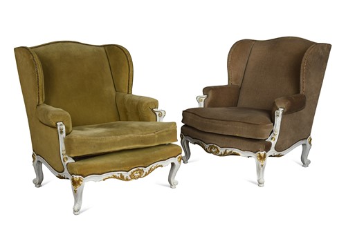 Lot 515 - A pair of Louis XV style white and gilt painted wingback armchairs