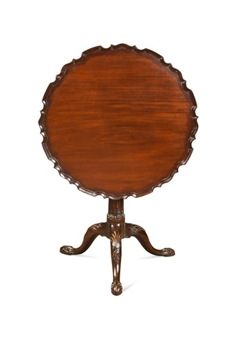 Lot 471 - A George III mahogany pie crust tripod table