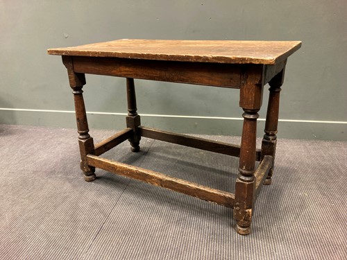 Lot 318 - A 17th century and later oak table, the...