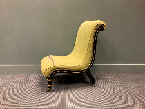 Lot 334 - An Aesthetic period ebonised slipper chair...