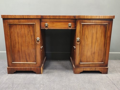 Lot 489 - A mahogany writing desk and a small mahogany...