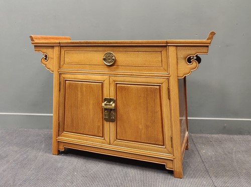 Lot 490 - A far Eastern side cabinet with hinged top and...