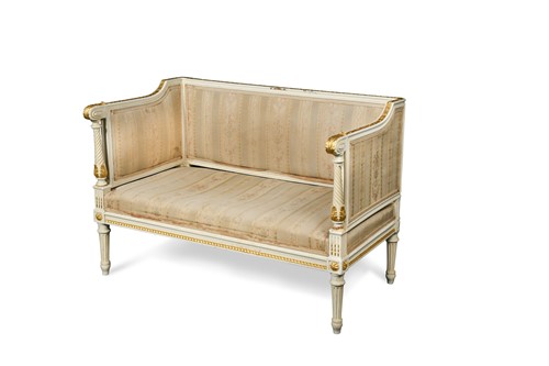 Lot 511 - A small Neo-classical style white painted and parcel gilt canape, late 19th century