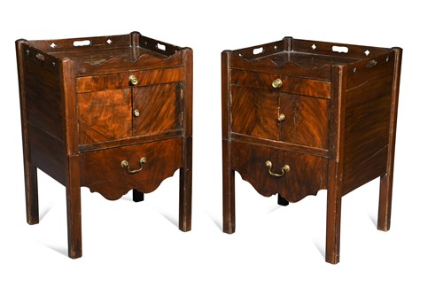 Lot 457 - A pair of George III mahogany tray-top night tables