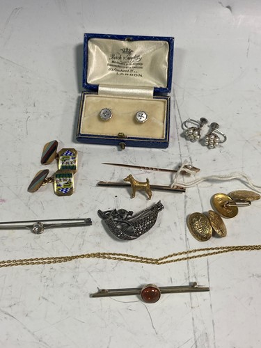 Lot 181 - A pair of hallmarked 9ct gold enameled...