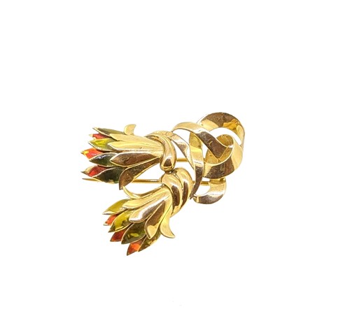 Lot 111 - An enamelled stylized floral clip brooch