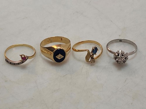 Lot 164 - An onyx signet style ring stamped '18K',...