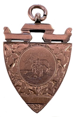 Lot 297 - An early 20th century 9ct rose gold fob medal