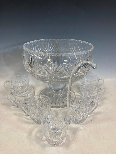Lot 64 - A large cut glass punch bowl on stand, six...