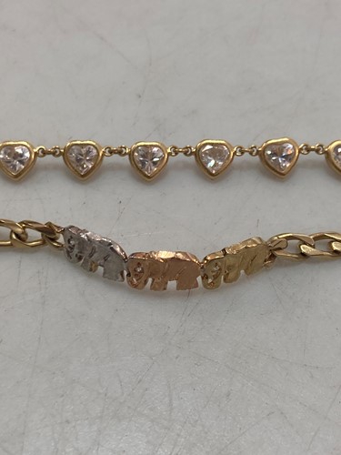 Lot 168 - A stone set heart necklace stamped '750,...