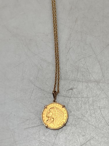 Lot 154 - An Indian head five dollar coin dated 1910, in...
