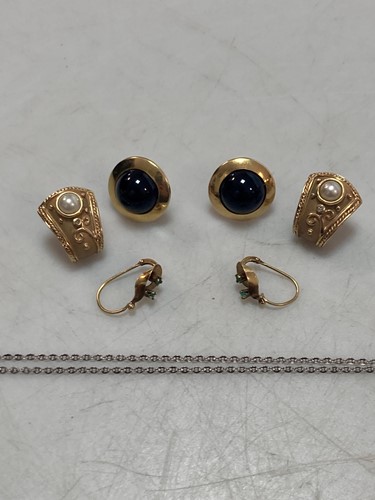 Lot 171 - A pair of domed earrings tested as 18ct gold,...