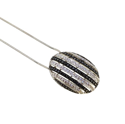 Lot 164 - A black and white diamond pendant and chain