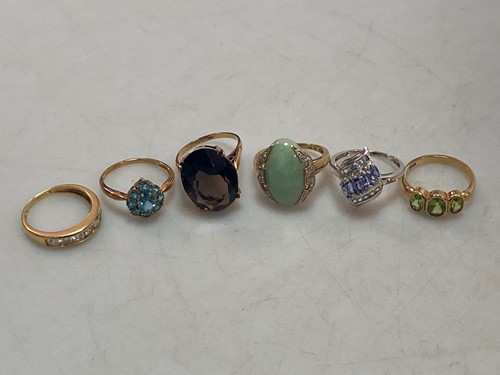 Lot 155 - Four hallmarked 9ct gold stone set rings and...