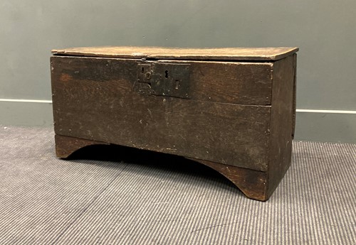 Lot 309 - A 17th century and later oak sword chest on...