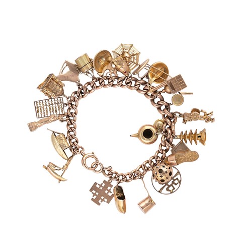 Lot 57 - A 20th century charm bracelet