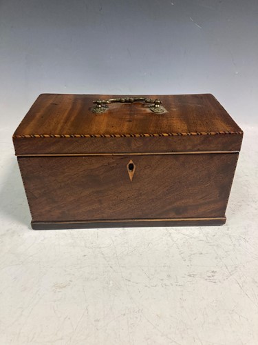 Lot 25 - A George III mahogany tea caddy, the hinged...