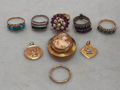 Lot 160 - A hallmarked 18ct gold emerald and diamond...