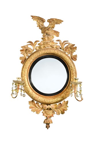 Lot 592 - A Regency giltwood convex girandole mirror