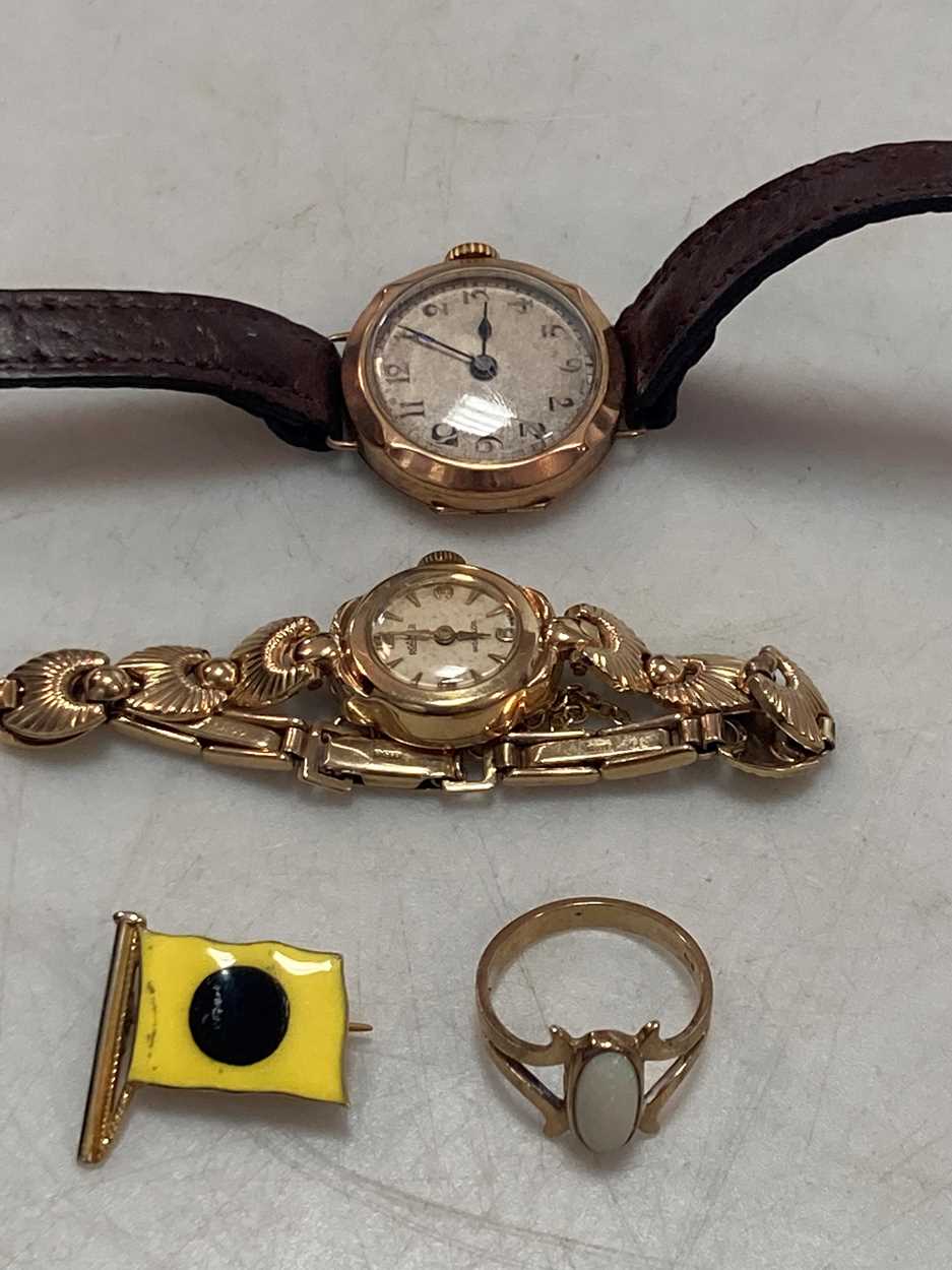 Lot 161 - A hallmarked 9ct gold Roamer watch, together...