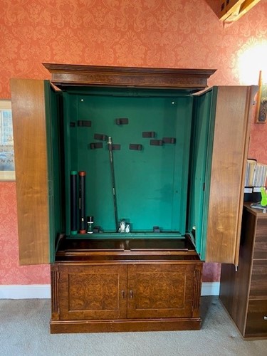 Lot 663 - An eight gun security cabinet disguised as a burr walnut bookcase by 21st Century Antiques