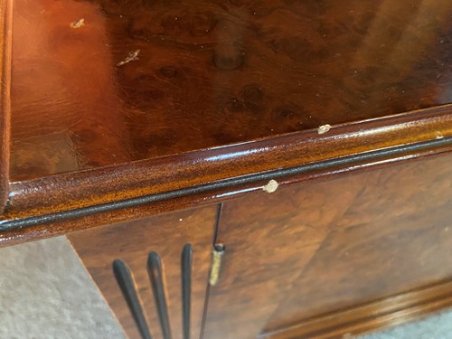 Lot 663 - An eight gun security cabinet disguised as a burr walnut bookcase by 21st Century Antiques