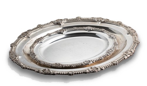 Lot 525 - A graduated pair of George IV silver meat dishes, mark of John Bridge