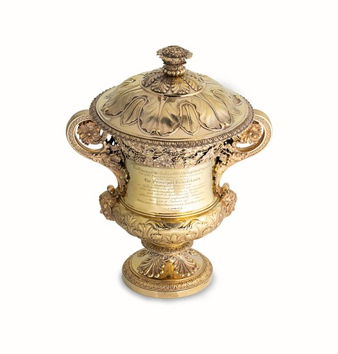 Lot 515 - A large and important George III silver gilt two handled presentation cup and cover