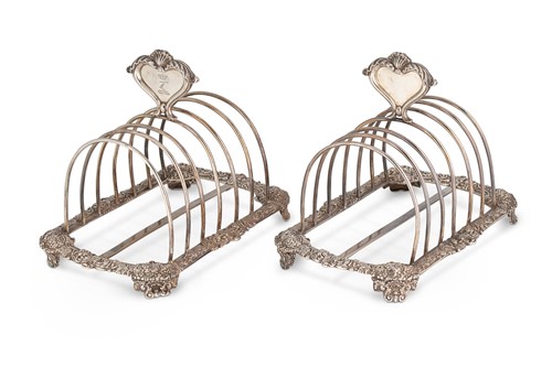 Lot 522 - A pair of George IV silver 7 bar toast racks, mark of John Bridge