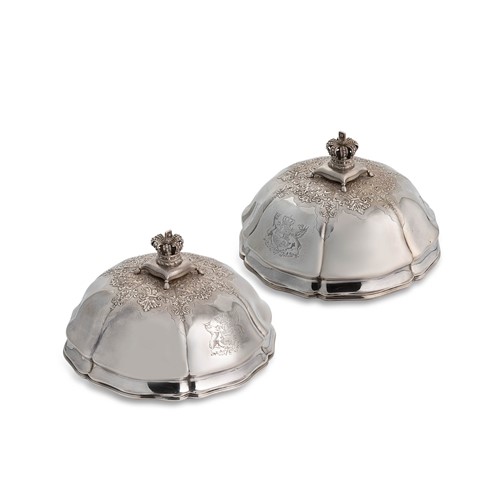 Lot 573 - A pair of Victorian silver domed vegetable dish covers