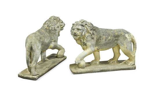 Lot 732 - An opposing pair of composite stone Medici lions, 20th century