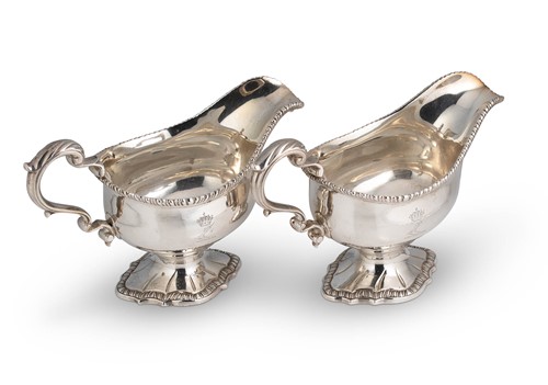 Lot 495 - A pair of George III 18th century silver sauce boats