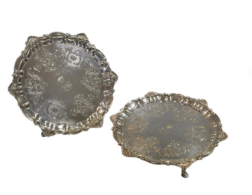 Lot 565 - A pair of Victorian silver waiters