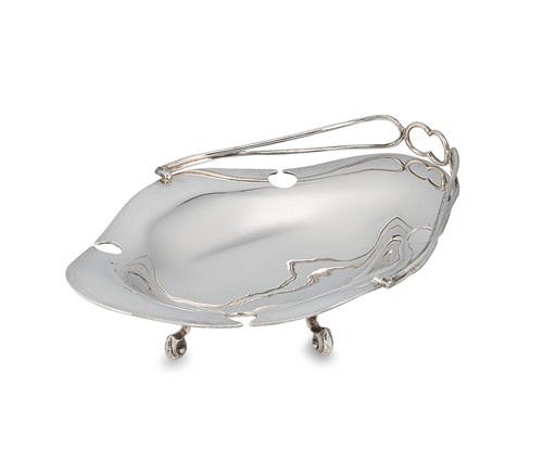 Lot 610 - A George V silver swing handled fruit basket
