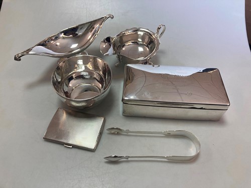 Lot 194 - A silver bowl together with a silver sauce...