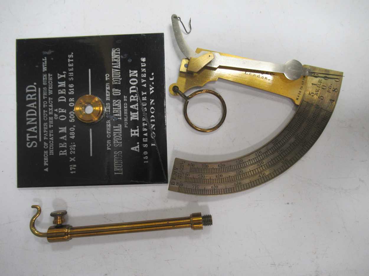 Lot 116 - A portable set of brass quadrant balanced
