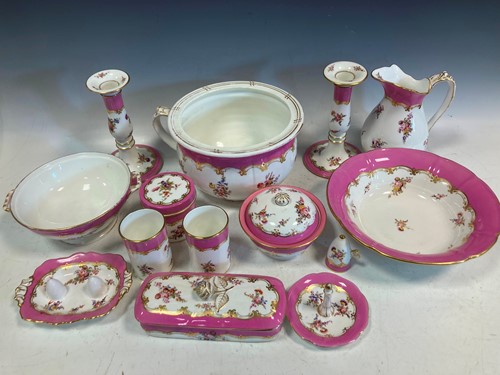 Lot 46 - A pink and floral decorated china bedroom set,...