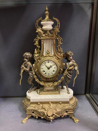 Lot 48 - A French style reproduction gilt metal and...