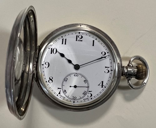 Lot 264 - Syren, Geneve - A George V Sterling silver half hunter pocket watch and chain with 2 fob medals