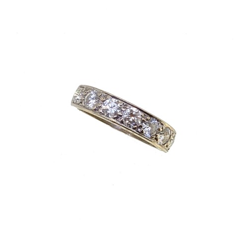 Lot 136 - An 18ct gold diamond set half hoop style ring