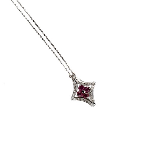 Lot 106 - A modern articulated ruby and diamond pendant