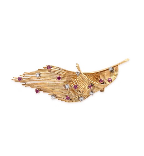 Lot 228 - Tiffany & Co. - A ruby and diamond feather brooch