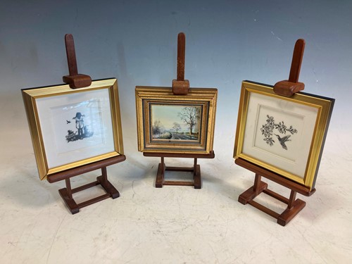 Lot 44 - Two small modern cut paper silhouette pictures...