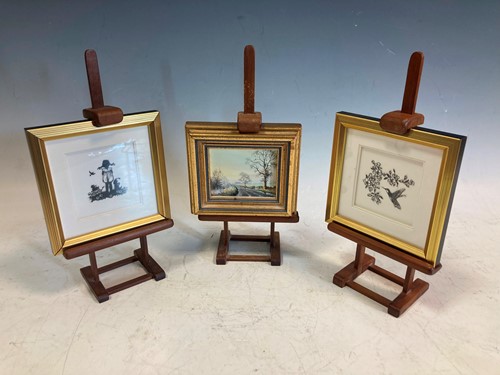 Lot 44 - Two small modern cut paper silhouette pictures...