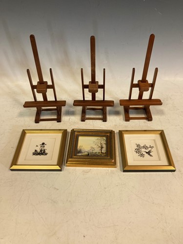 Lot 44 - Two small modern cut paper silhouette pictures...